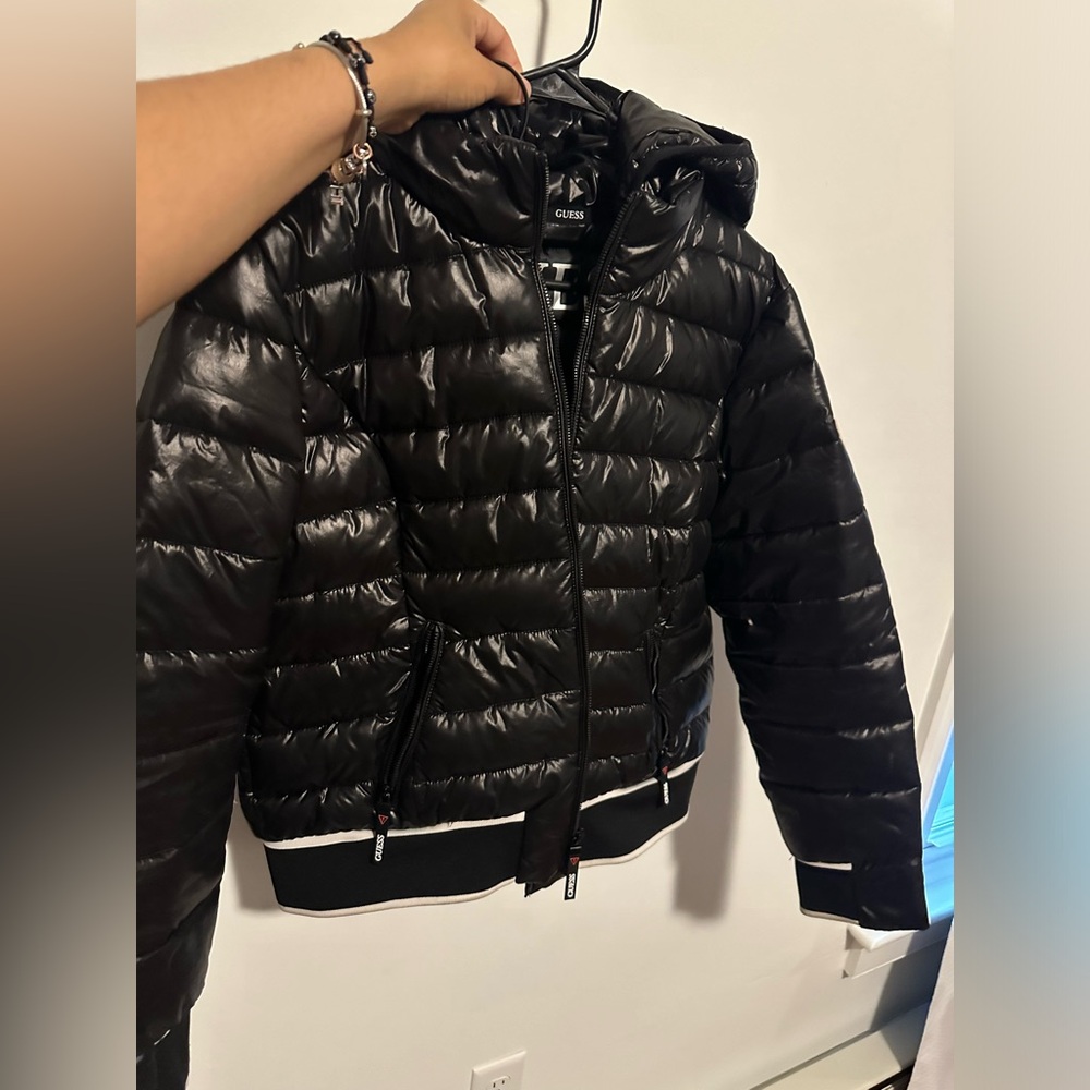 Black Guess puffer jacket.
